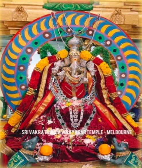 Sri Vakrathunda Vinayagar, adorned with silver kavacham and garlands